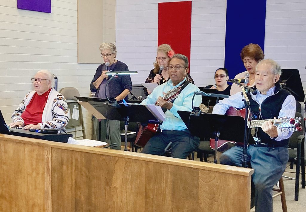 In this photo, the Saint Paul's band leads a song at worship.